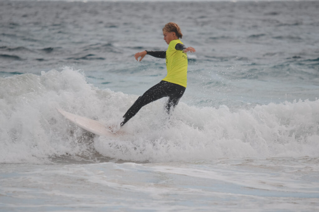 Trigg Island SLSC member competing during the Standup Surfing Championships